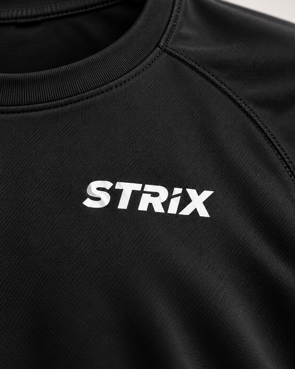 Black Strix T-shirt - fabric and seam detail